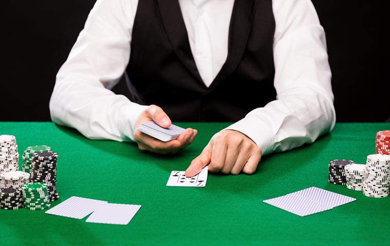 Dealer dealing a blackjack game